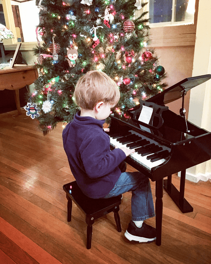 boy playing piano