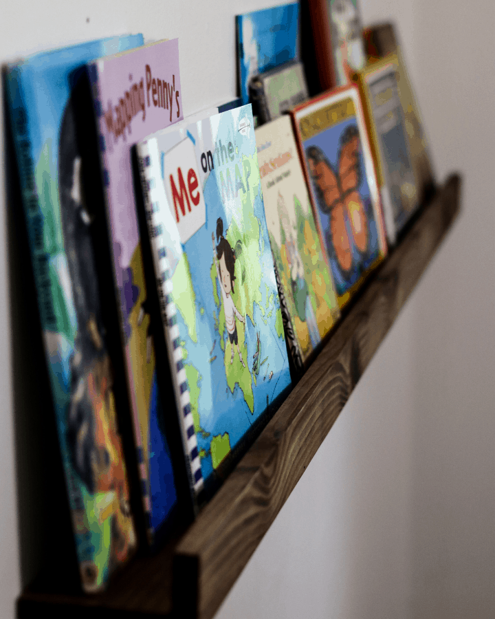 A wall bookshelf created for a small homeschool room.
